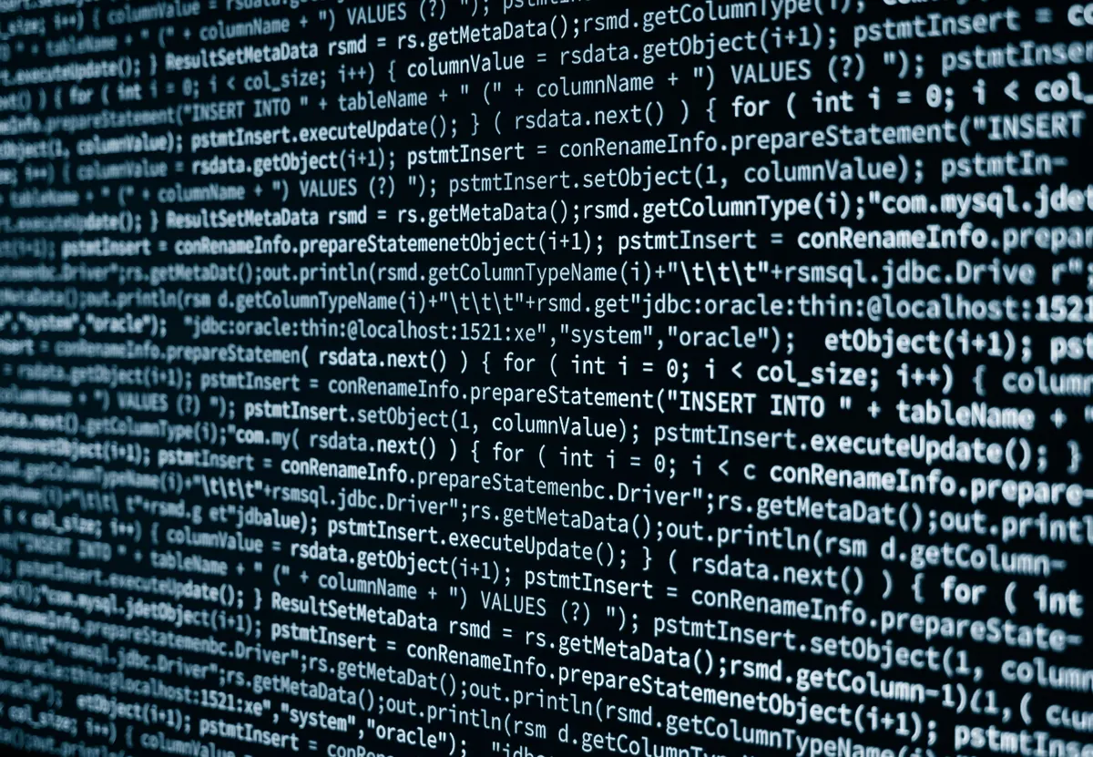 Blue code against a black background.