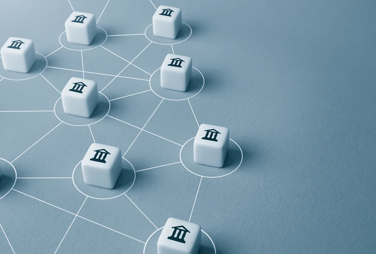 Small white tiles with pictures of banks on them.