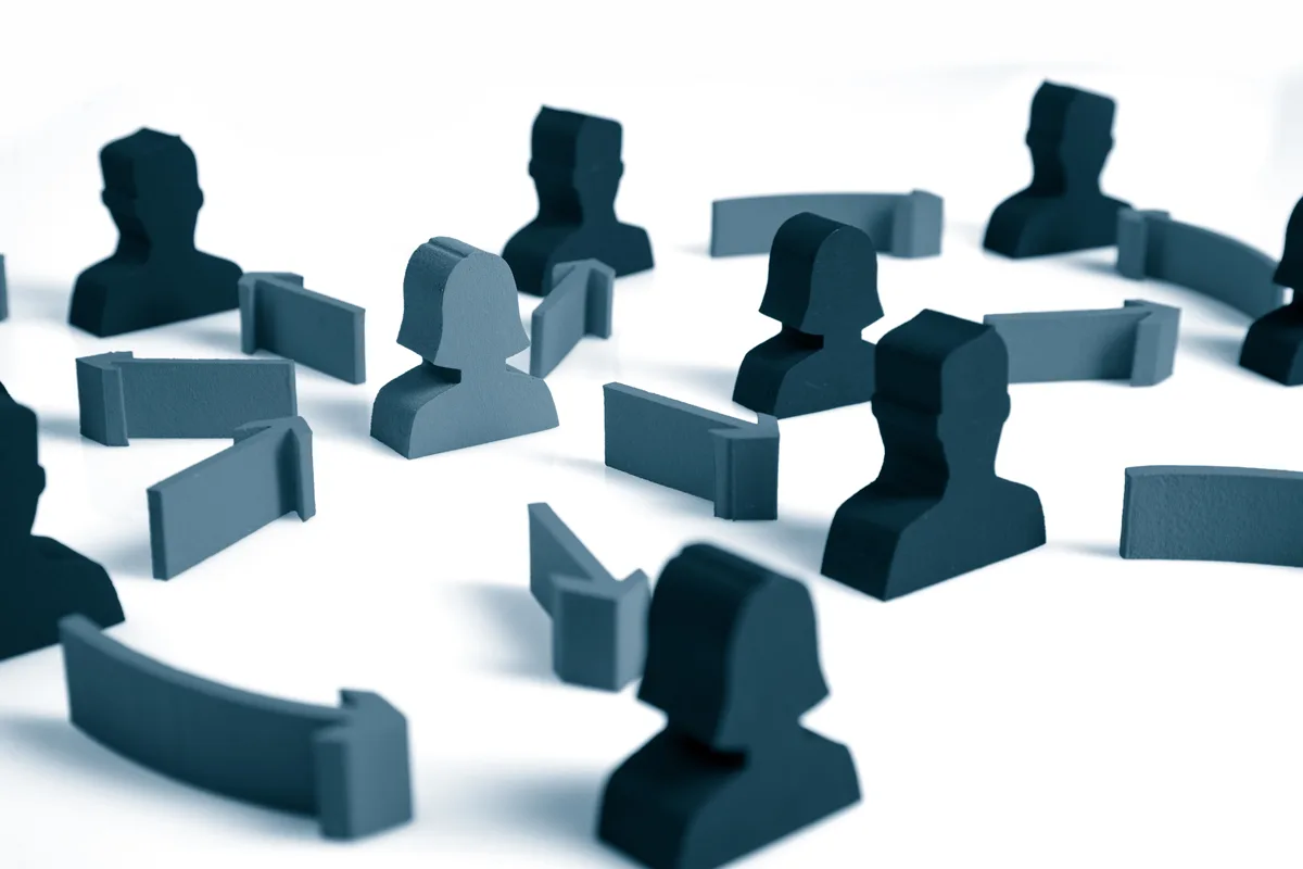 Cut-outs of people connected with arrows.